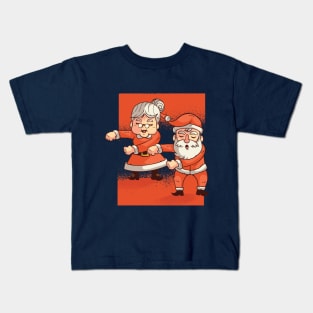 Mr & Mrs. Claus floss dance Kids T-Shirt